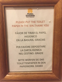 piedra escondida multilingual sign