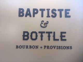 Baptiste and Bottle Sign the Lowdown