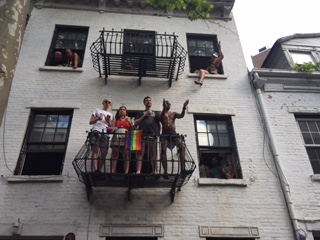 NYC Pride Parade people watching from building 2018